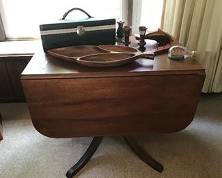 Beautiful drop leaf table. Very versatile,