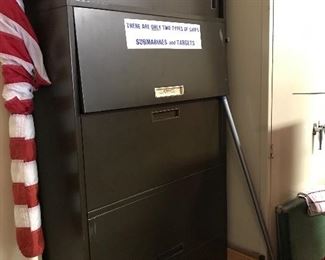 Large metal cabinet with drawers for files and shelves