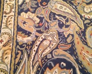 5 feet x 8 feet rug in golds and blues
