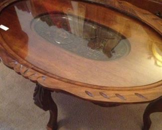 Oval glass top coffee table