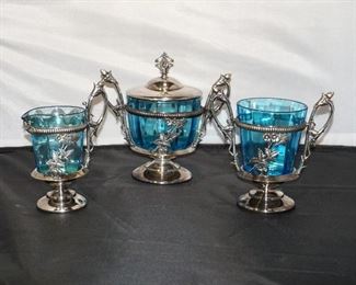 Silver sugar and creamer set.