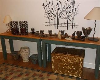 Pair of console tables, hammered brass trunk