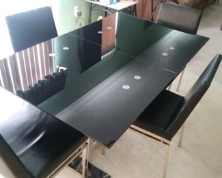 Black lacquer table and four matching chairs