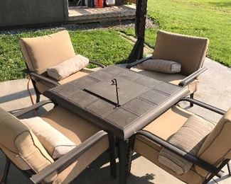 Patio set with cooler and fireplace Built in on the center of the table