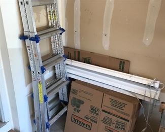  Adjustable ladder and three Hi Def LED shop lights