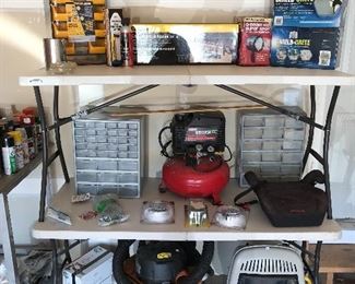  Rigid shop vac, Craftsman  air compressor,  propane heater, 2 Unopened boxes of Sheild Crete and  Multi drawer hardware storage units