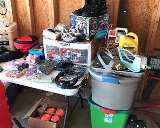  Brand new set of pots and pans, lawn sprinklers, boots, and  Full box of  Clay Skeet disc’s