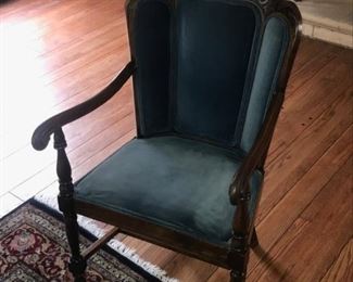 Interesting upholstered chair with faceted back. $75