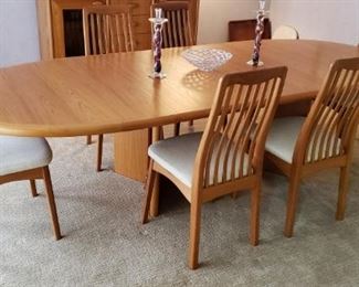 ANSANGER MOBLER OF DENMARK TEAK DINING TABLE W/6 ARMLESS CHAIRS BY BENNY LINDEN DESIGN.   112" LONG X 45" WIDE.  EXQUISITE!!!!  DIMENSIONS INCLUDE 2 LEAVES