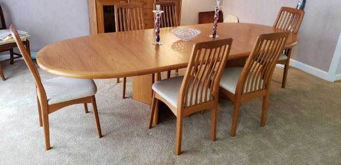 ANSANGER MOBLER OF DENMARK TEAK DINING TABLE W/6 ARMLESS CHAIRS BY BENNY LINDEN DESIGN.   112" LONG X 45" WIDE.  EXQUISITE!!!!  DIMENSIONS INCLUDE 2 LEAVES