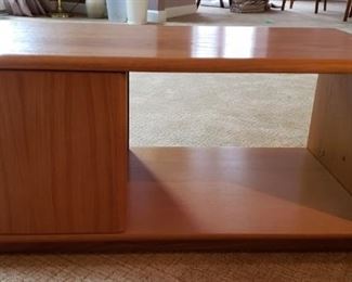 TEAK COCKTAIL TABLE 37" L X 18" D x 16" H    w/ DOOR ON FRONT AND BACK THAT OPENS  FOR STORAGE