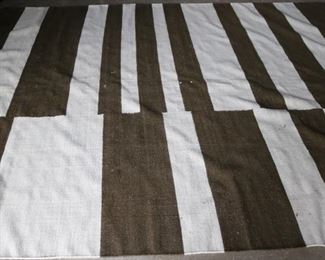 8 x 9.11 brown and white rug