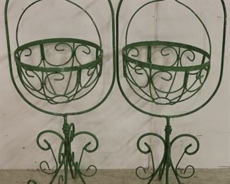 green swinging basket planters