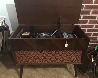 AM/FM, turntable and 8 track player....Electrophonic Solid State Console Stereo, 8 track player needs TLC