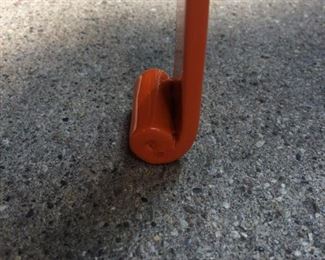Closeup of Orange Garden Table leg.