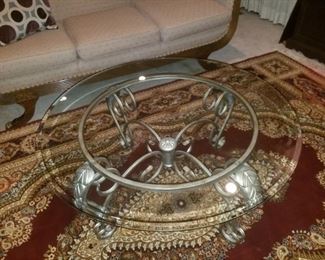 Round glass-top coffee table