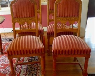 Four early 20th Century dining room chairs. 