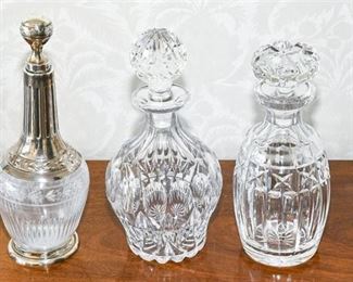125. Lot of Three Fine Cut Crystal Decanters
