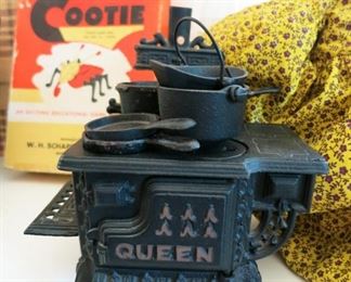 Vintage Queen cast iron stove w/ cookware