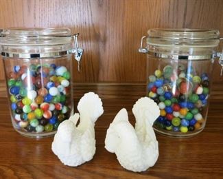 Vintage marbles including some shooters, pair bird figurines