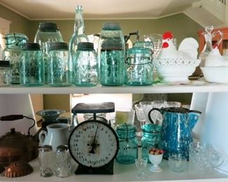 Collectible aqua canning jars, milk glass hen on nests, copper tea pot & molds, kitchen scale, etc.
