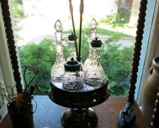 Antique cruet set, miniature sad iron on stand