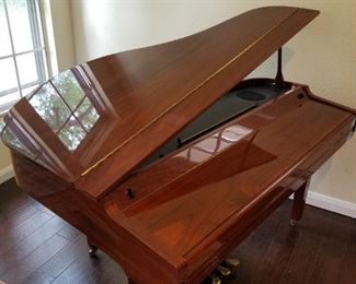 ABSOLUTELY STUNNING Samick 151 Digital/ electric Baby Grand Piano! Not only a fabulous musical instrument, but a BEAUTIFUL WORK OF ART! Exquisite piece of furniture,  even if you dont play! Someone you know does! Comes with a matching stool! Easy to move. Not too heavy. No professional piano mover needed!