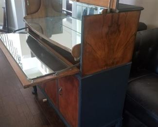 VERY COOL antique bar. I call it the Dean Martin! Nicely painted black sides and trim to go with any style or decor!