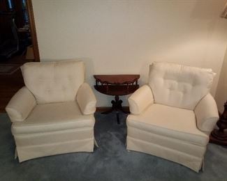2 nice white chairs