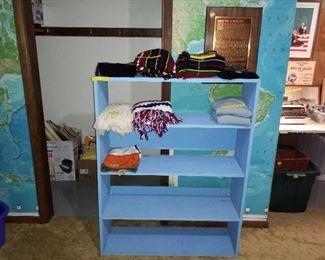 Blue shel with hand woven things