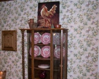 Curved glass curio cabinet