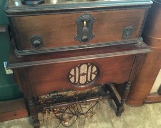 Vintage record player with storage for records in the bottom. 