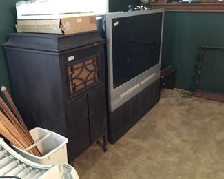 Vintage record player in cabinet - projection TV