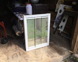 Mirrored cabinet