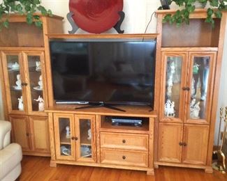 ENTERTAINMENT CENTER OR WILL SEPARATE AS ALL SIDES ARE FINISHED. SO COULD BE 2 DISPLAY CASES AND TV STAND