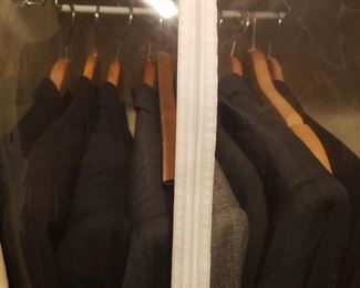 Several hand made custom ordered men's suits 