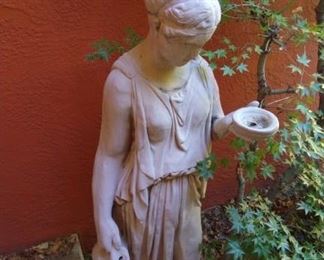 Garden statue of a woman.