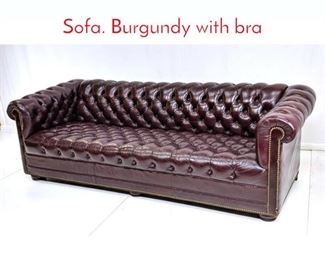 Lot 380 Chesterfield Tufted Couch Sofa. Burgundy with bra