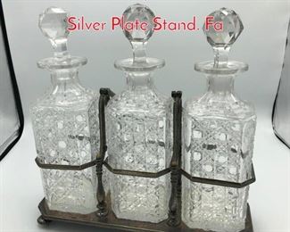 Lot 385 3 Cut Crystal Decanters in Silver Plate Stand. Fa