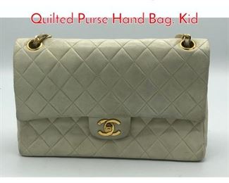 Lot 403 CHANEL Beige Leather Quilted Purse Hand Bag. Kid 