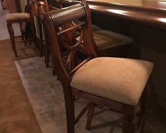 Six custom upholstered barstools