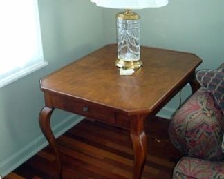One of a pair Henredon end tables and one of a pair Waterford lamps.