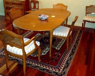 Henredon mahogany table and set of chairs.