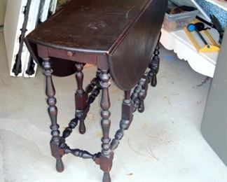 Antique gate leg drop leaf table.