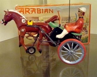 Vintage Arabian clock work horse and buggy in good working order. Made in Germany.