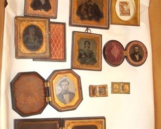 Antique daguerreotypes including  minatures of Abe and Martha Lincoln.
