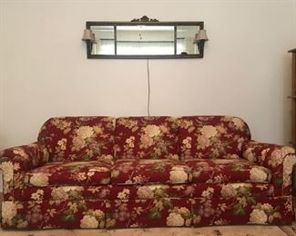 Custom couch, antique lighted buffet mirror