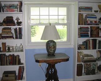 Marble top table and library of books