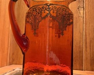 46. Sterling Overlay on Amber Pitcher (10.5'')