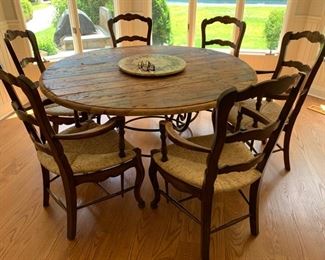 59. Rustic Plank Top Dining Table on Wrought Iron Base (62'' x 31'')
60. 5 French Provincial Ladderback Arm Chairs w/ Rush Seat (23'' x 21'' x 41'')